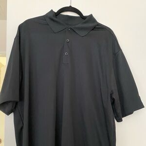 Men’s Nike golf shirt in black. Size XL.